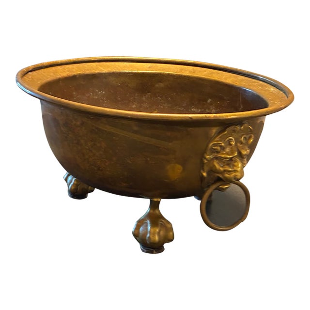 Antique Footed Brass Jardiniere With Lions Masks and Handles For Sale