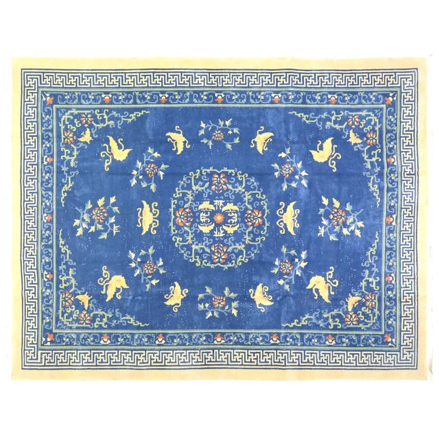 Hand-knotted with care using traditional rug-making techniques, this wool rug blends timeless craftsmanship with a modern...