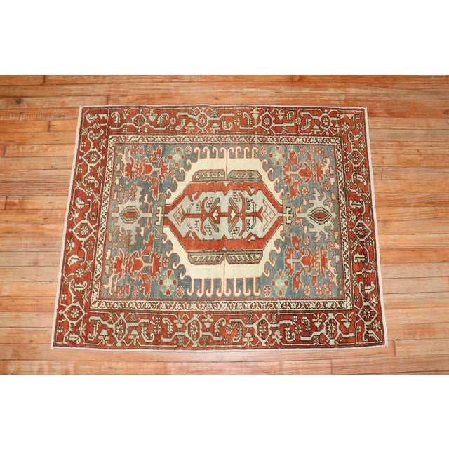A Square Antique Persian Heriz rug from the 2nd quarter of the 20th century. Measures: 3'4'' x 4'1''.