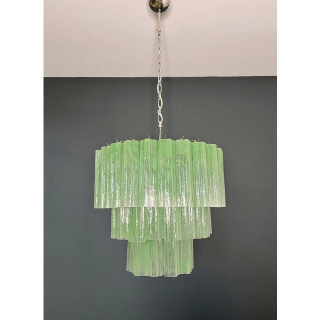 Italian vintage chandelier in Murano glass and nickel-plated metal structure.The armor polished nickel supports 101 large...