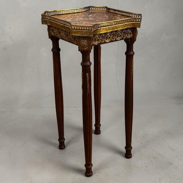 Antique French Marble Top And Decorated with Ormolu Mounts Side Table. Sizes :- 30x30 cms and 58 cms tall. An antique so...