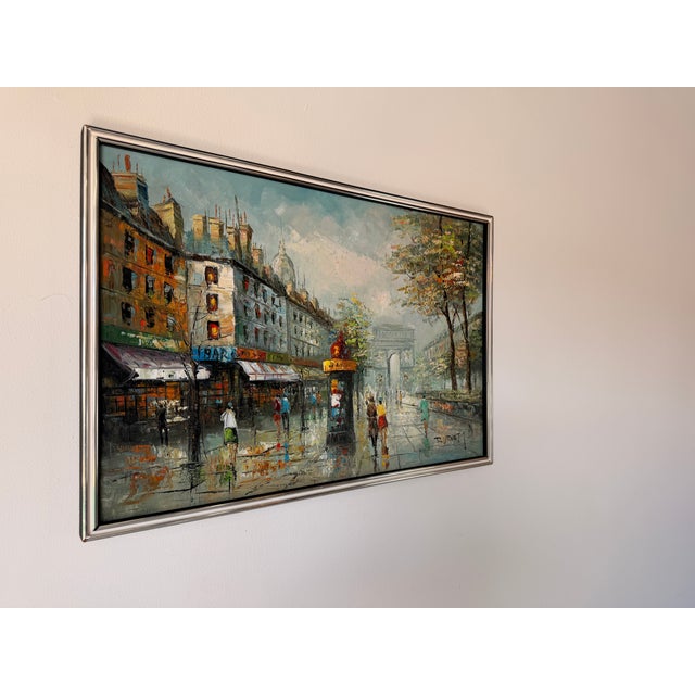 Beautiful vintage oil on canvas depicting a charming Parisian street scene. Signed by Burnett, this impressionist-style...