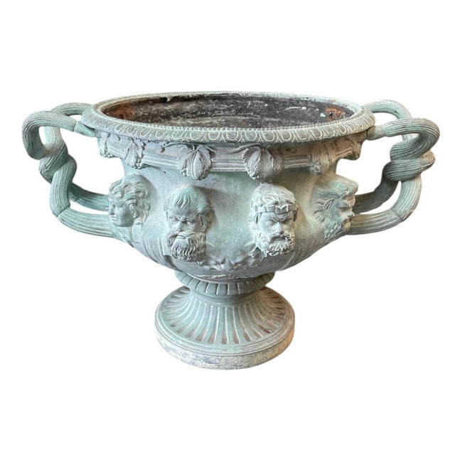 An impressive and substantial cast bronze planter or garden urn, featuring a rich, naturally aged verdigris patina. This...