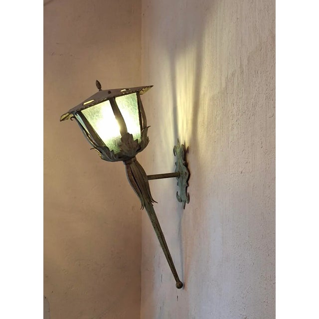 Mid century French green painted iron and glass outside lantern, patinated paintwork, with decorative scrolls and acanthus...