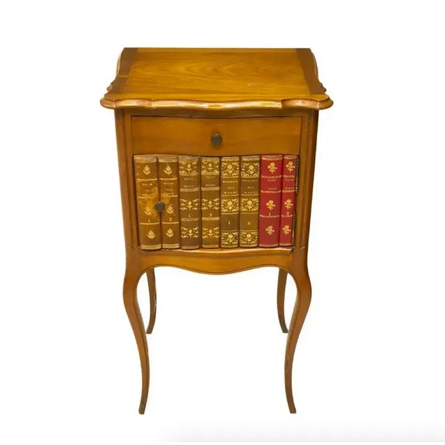 Lovely vintage French Louis XV style fruitwood bedside cabinet. Circa early 20th c. (1920's to 1940's) France. Presents...