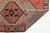 Elevate high-traffic interiors, hallways, or entryway galleries with this striking vintage hand-knotted Kurdish wool...