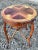 Very nice early 1900”s delicate, intricately carved French side table with Rosewood top with marquetry inlay. Graceful...