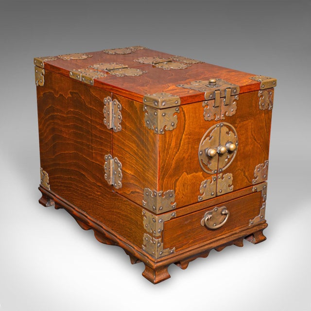 This is a vintage valet case. A Korean, Oriental elm swing-out grooming box, dating to the late 20th century, circa 1970....