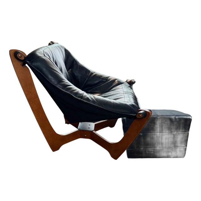 1970s Experience Timeless Comfort With the Odd Knutsen Luna Genuine Leather Chair & Ottoman Set. For Sale