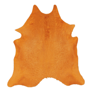 Rug & Kilim’s Contemporary Cowhide Solid Rug in Vibrant Orange Hues