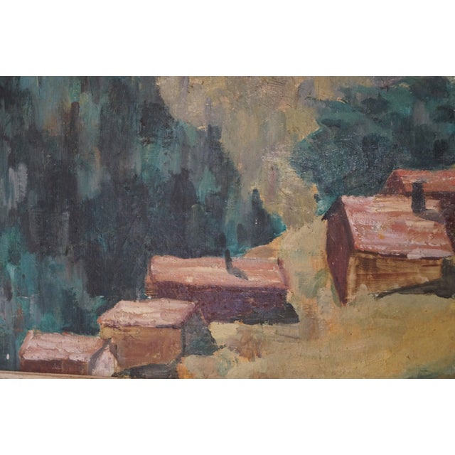 A stunning early work from Texas artist Alma Hobson which depicts a smattering of houses on a hill with mountains in the...