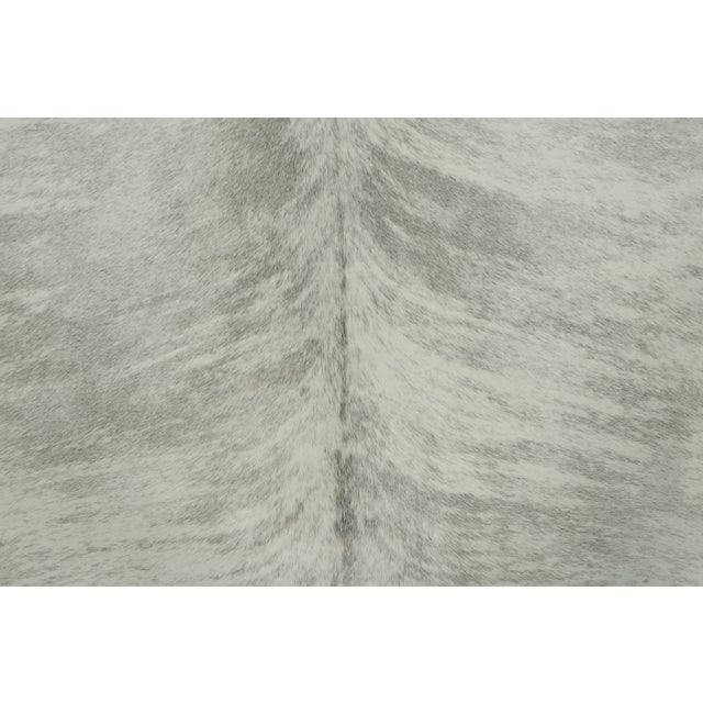This 7x7 contemporary cowhide rug is an exciting new addition to Rug & Kilim’s Modern collection—a naturally shaped animal...
