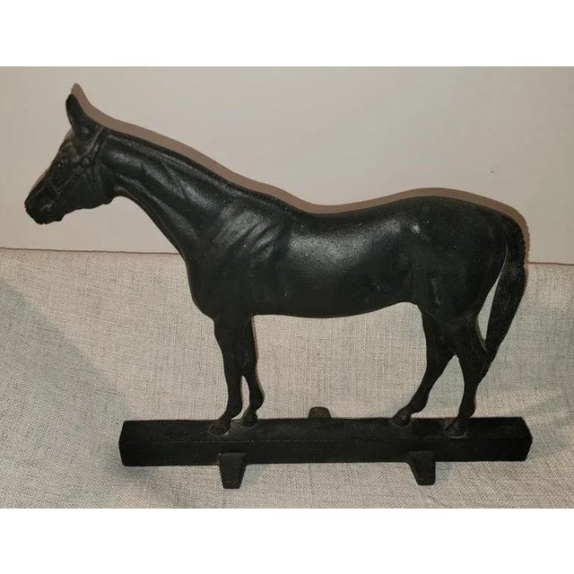 Cast iron horse doorstop Signed Hunter. Copyright 1949. VA Metal Crafters, Waynesboro, VA.