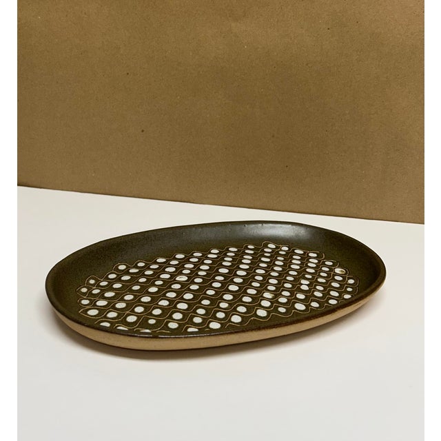 Marshall Studios collector's piece. Dish features line and dot motif. Signed "Martz" on bottom with original brand sticker.