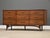 A mid century modern walnut dresser with a scratch resistant formica top by Johnson Carper. Circa 1960’s. Made in USA....