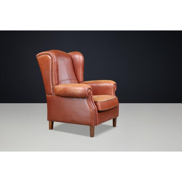Patinated Cognac Leather Wingback Lounge Chair, Netherlands, 1960s For Sale - Image 12 of 13
