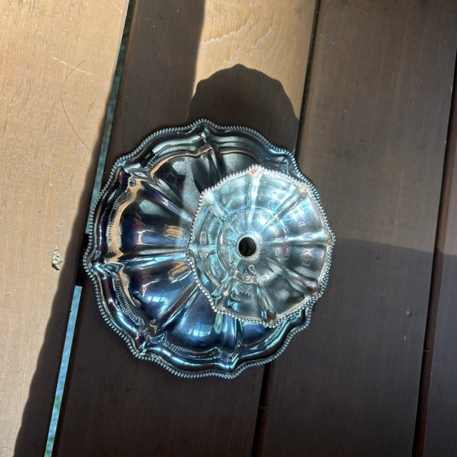 Elevated serving tray. Used to hold wrapped candy for the great grandchild when visiting (us)