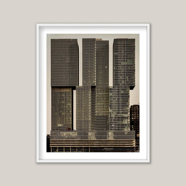 De Rotterdam. An architectural photograph of De Rotterdam, a monumental mixed-use complex on the banks of the Maas in the...