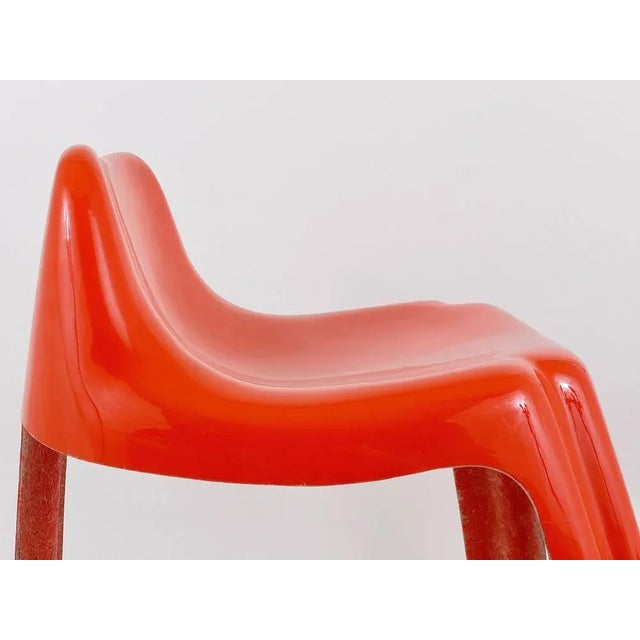 A beautiful orange midcentury stool or chair from the 1970s, made of lacquered fibreglass, model Ginger, by Patrick...
