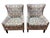 Stylish pair of generously scaled upholstered armchairs featuring a softly flared wingback silhouette, gently curved arms...