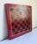 An authentic antique checkerboard from the late 19th to early 20th century. The piece is a classic example of early...