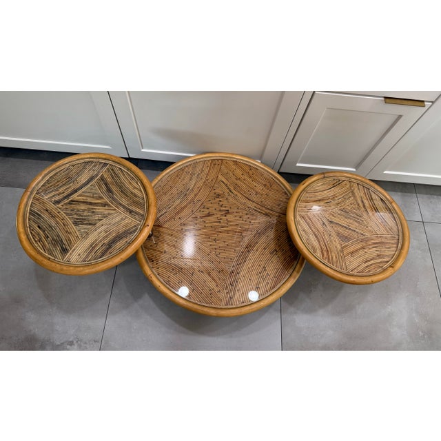 A sculptural Mid-Century Modern articulating cocktail table in the Italian style, evoking the organic reed-and-glass in...