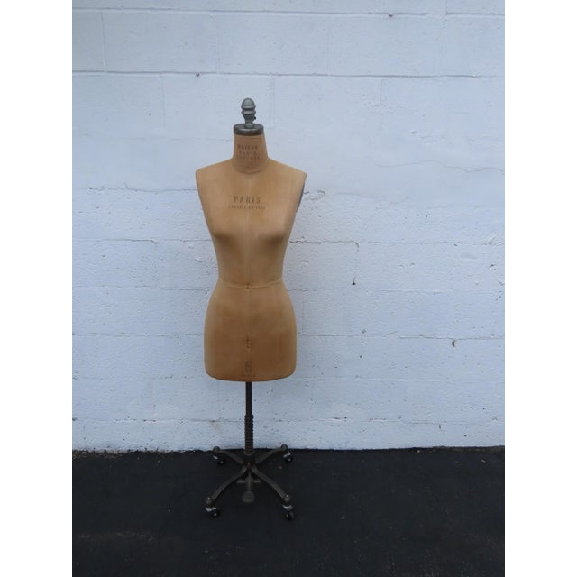 This gorgeous Dress Form is made of fabric, metal, and wood. This stunning mid-century style dress form was made by...