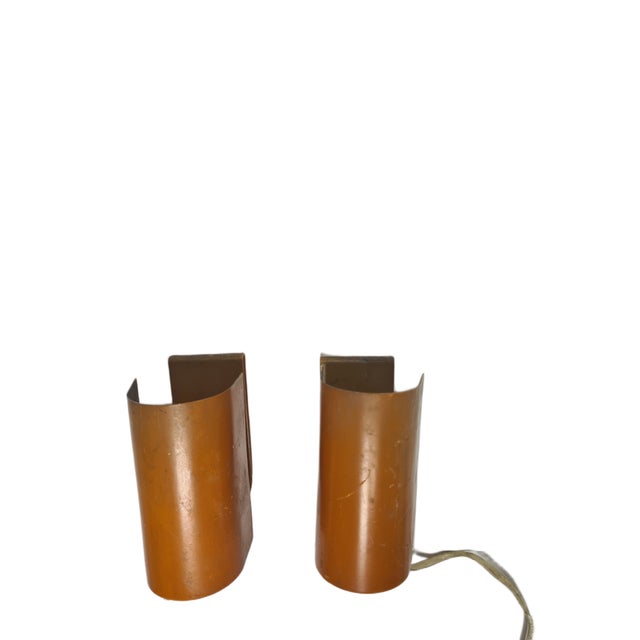 A pair of sconces from the 70s. They are preserved in good condition. European Plug (up to 250V).The wiring of this item...