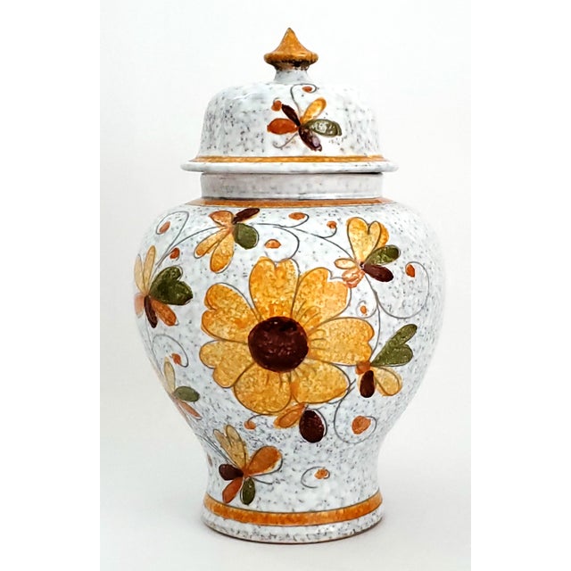 Offering a vintage Italian Ceramic hand painted ginger jar, circa 1960s. This particular ginger jar has finger marks on...