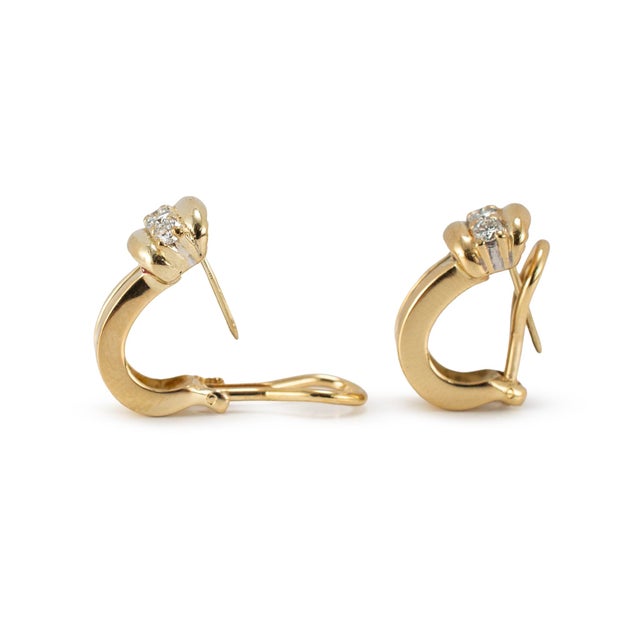 Brand: Tiffany & Co. Gender: Ladies Metal Type: 18K Yellow Gold Length: 0.75 inches Width: 10.10 mm Weight: 10.38 grams...