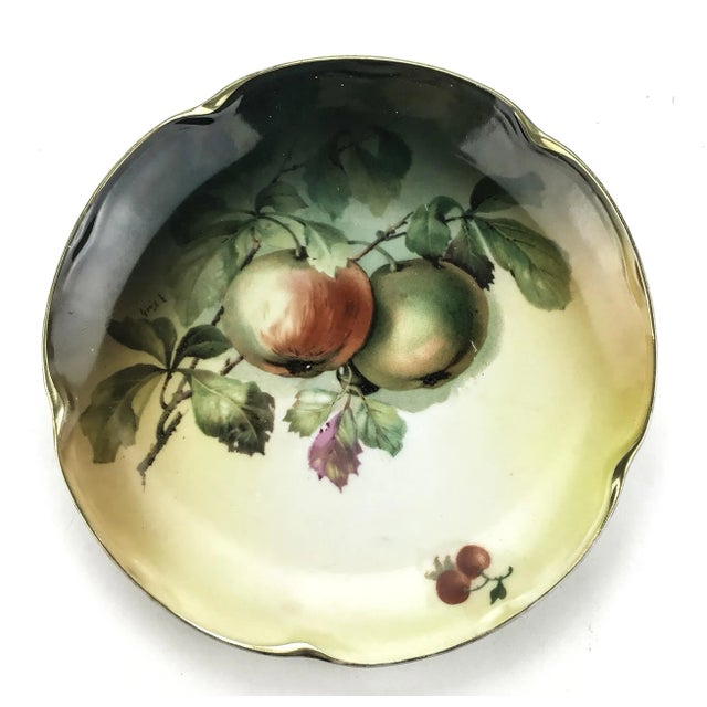 Excellent condition with no issues and gift worthy! This plates has been hand decorated and gold rimmed. Apples are the...