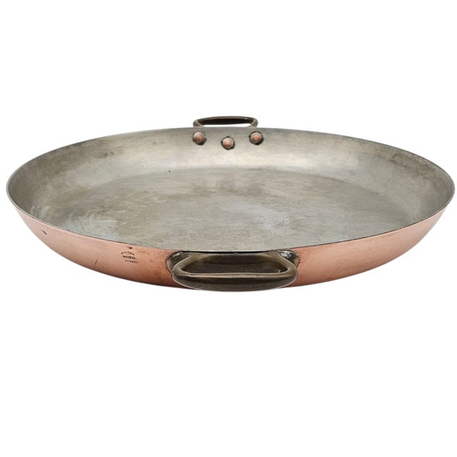 An heirloom of French kitchens, this copper paella pan stirs up more than saffron and rice. Tin-lined, burnished with...