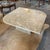 Vintage Italian marble coffee table with beautiful natural veining. In the popular cat eye or teardrop shape. It features...