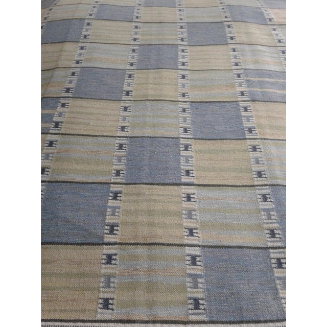Experience the beauty of our handcrafted wool rug, designed in a contemporary Scandinavian style featuring a striking...