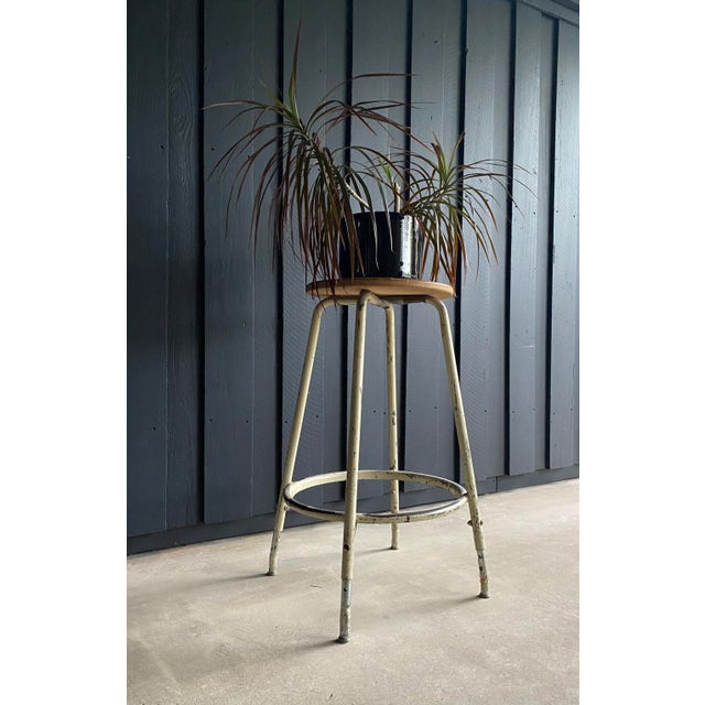 Straight from a woodworking studio, this industrial steel stool has been a workhorse for decades and shows authentic,...