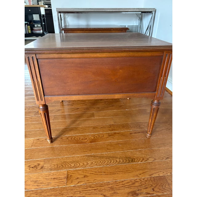 Mid-Century Henredon end table set in fair condition. There are some scrapes and normal wear and tear as they were passed...