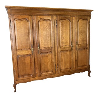 Vintage French Louis XVI Style Carved Oak 4-Door Wardrobe For Sale