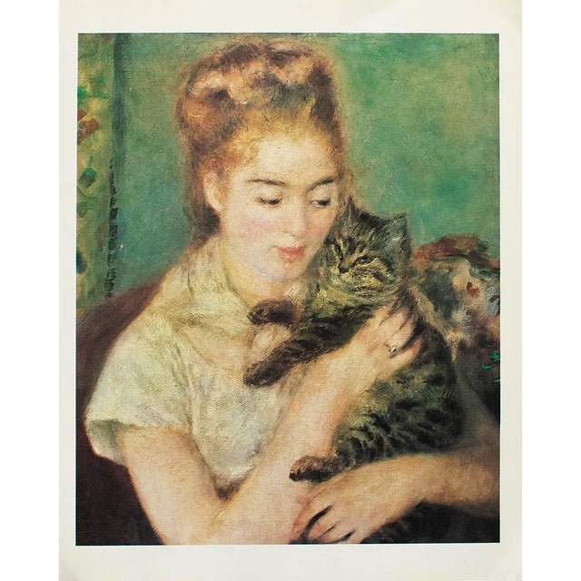 An excellent large full-color print after Impressionist painting "Woman With a Cat" by Auguste Renoir. Comes from a...