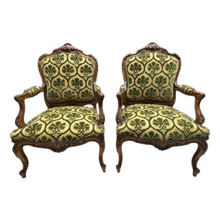 Antique French Louis XV Style Carved Walnut Bergere Armchairs With Green and Gold Damask and Nailhead Details - Set of Two For Sale