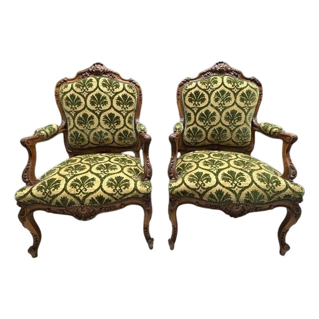 Antique French Louis XV Style Carved Walnut Bergere Armchairs With Green and Gold Damask and Nailhead Details - Set of Two For Sale
