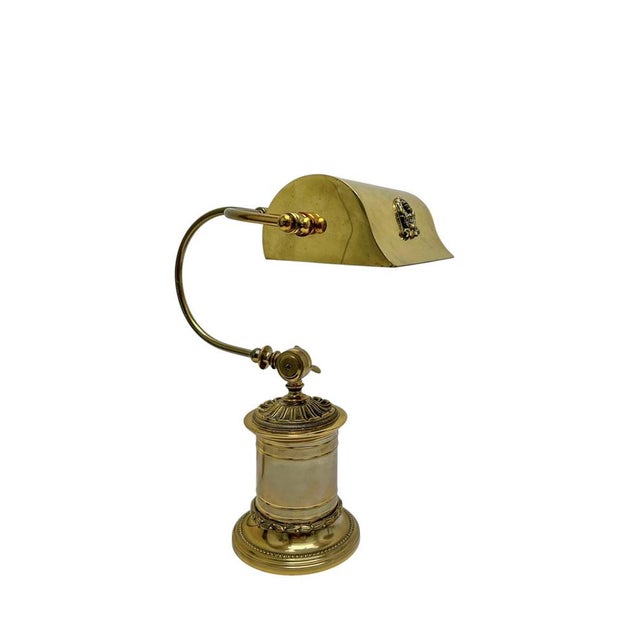French Desk Lamp or Banker's Lamp in an elegant Louis XV-Neo-Baroque design. It is made of heavy-quality brass with...