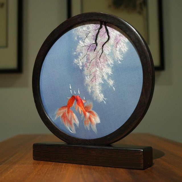 This exquisite Suzhou (Su) embroidery piece features delicately hand-stitched goldfish, crafted using the renowned double-...