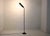 Model 1086 reading lamp by Gino Sarfatti, produced by Arteluce around 1961. Tubular structure resting on a slender tulip...