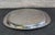 Alessi, Italy oval stainless steel tray. The manufacturer’s mark is stamped on the back of the tray.
