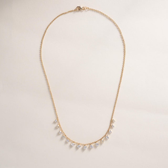 This is a vintage inspired riviere necklace featuring recycled old European and old mine cut diamonds set in 18k gold...