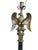 Excepcional eagle lamp from the mid 1900s. It is made of a metal allow with a burnished gold finish. The pillar body is...