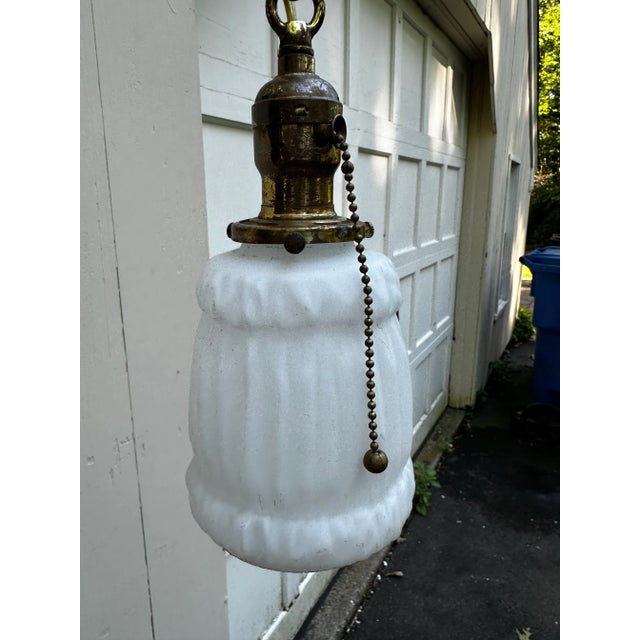 Old Lights On is pleased to offer this awesome linenfold shade with vintage brass hanging fixture. It is rewired and ready...