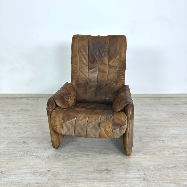 Dimensions: H 38.7” x W 28.5” x D 29” x SH 16” Vintage De Sede DS 50 brown Buffalo leather patchwork recliner lounge...