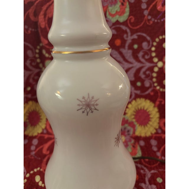 Beautiful Lamp! In very good condition. Milk glass and starbursts have no defects. Labor is in working excellent working...