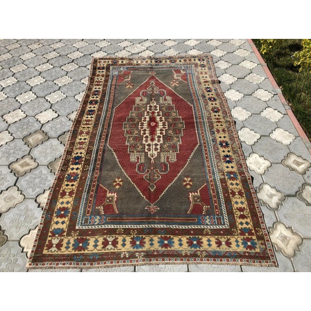Beautiful vintage Turkish Carpet rug is around 70 years old and in very good condition. This Carpet was hand-woven in the...